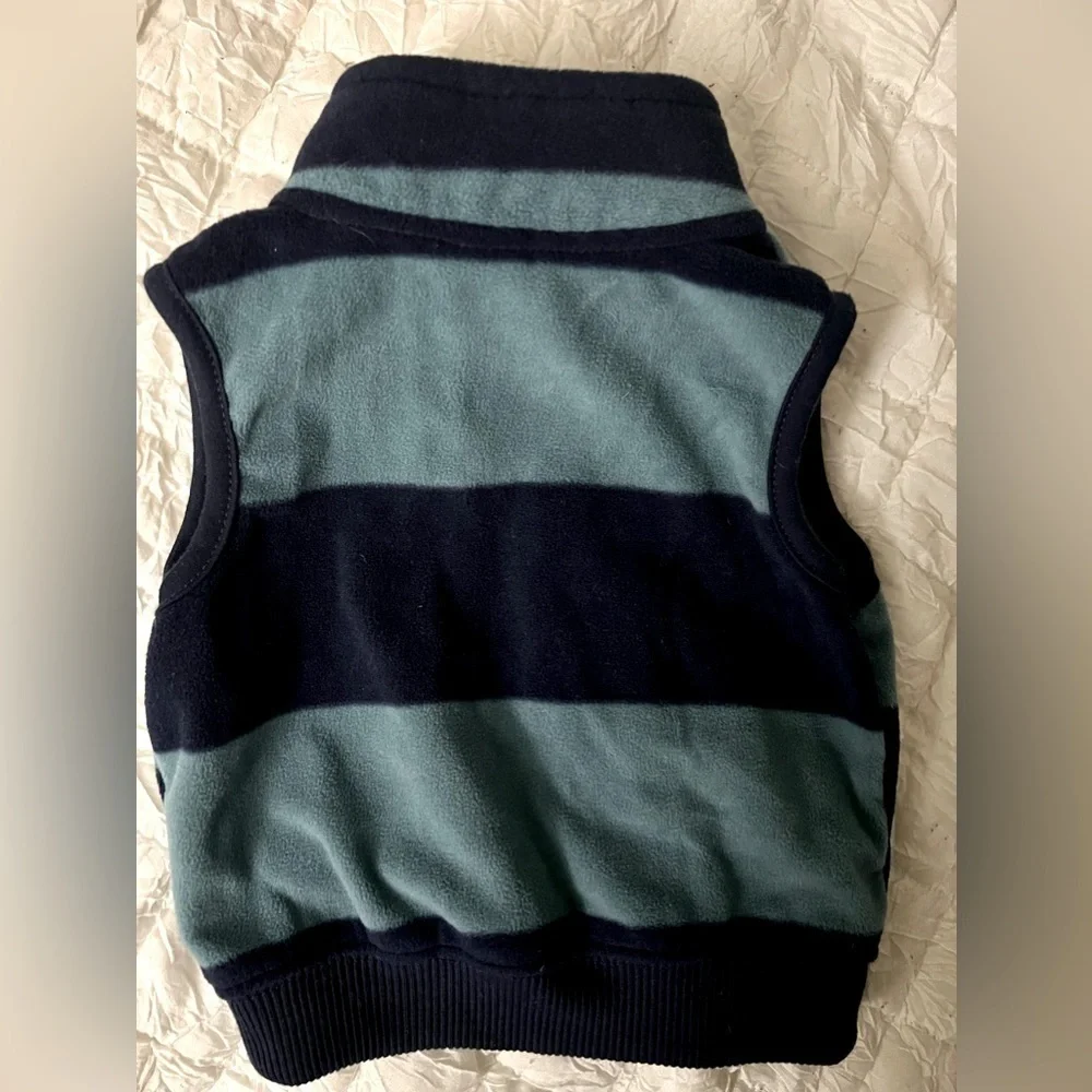 Two toned blue Fleece kids vest. Size 6m Carters brand. Full front zipper